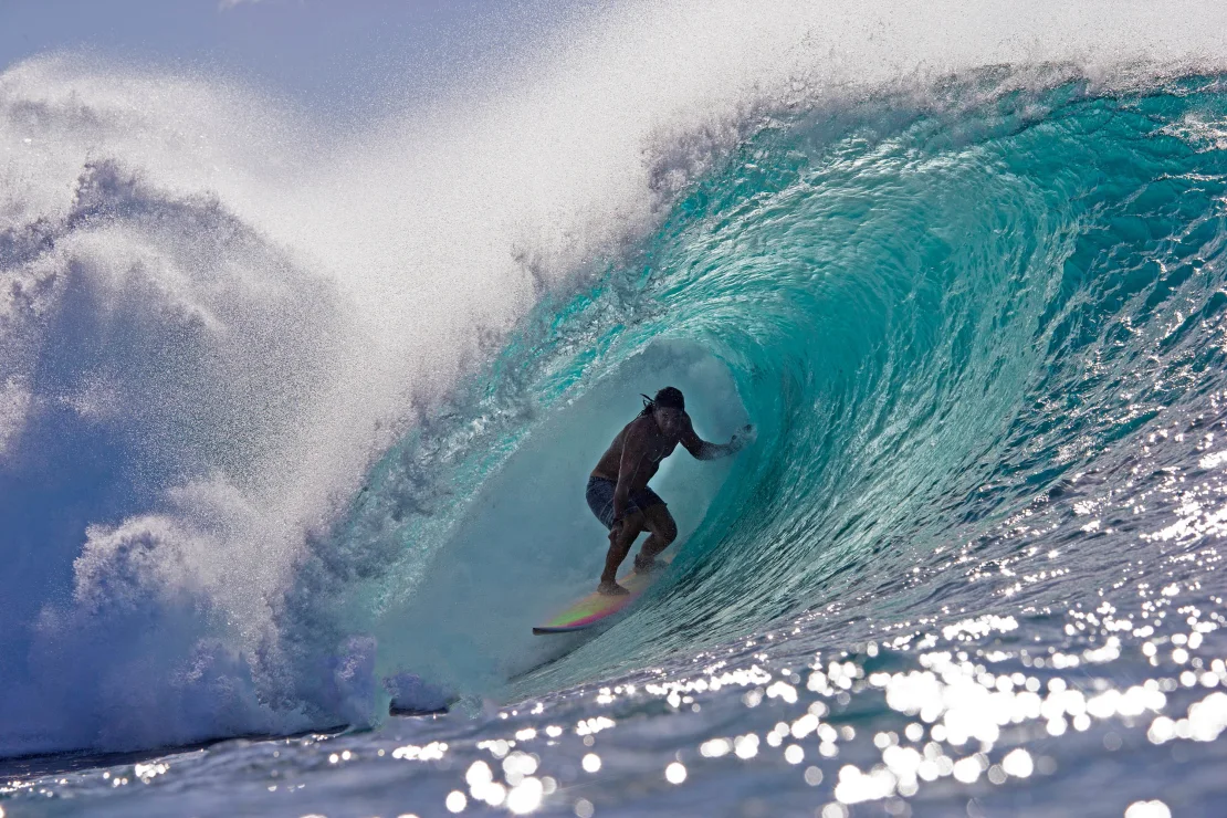 La esposa de Perry, Emilia Perry, le atribuye a él el mérito de haberla ayudado a afinar sus habilidades con el surf. (Crédito: Brian Bielmann/AFP/Getty Images)
